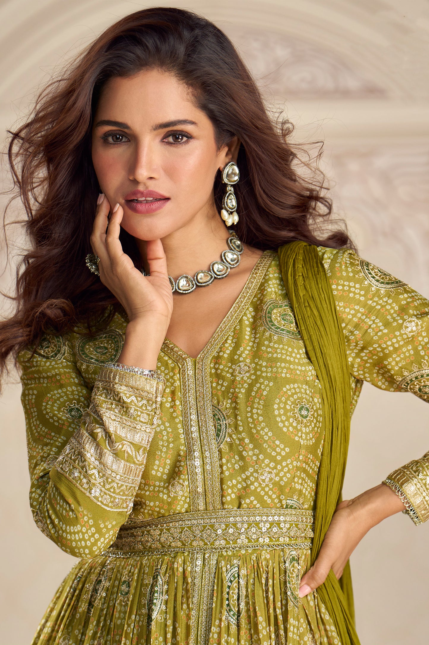 Close up of embroidery work on mustard yellow anarkali