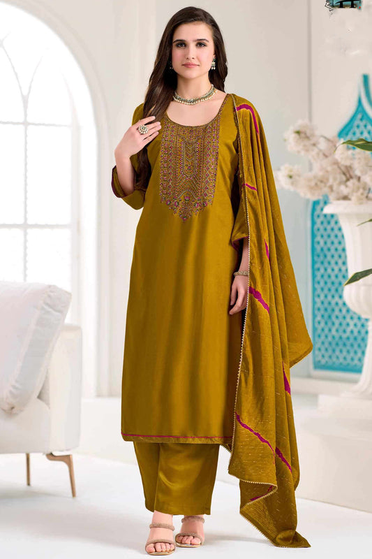 Embroidery work detail on mustard yellow outfit