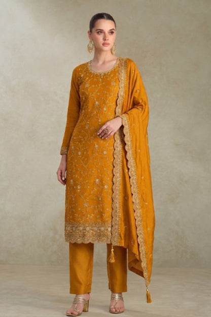 Model wearing Mustard Yellow Salwar Kameez with sequin embroidery