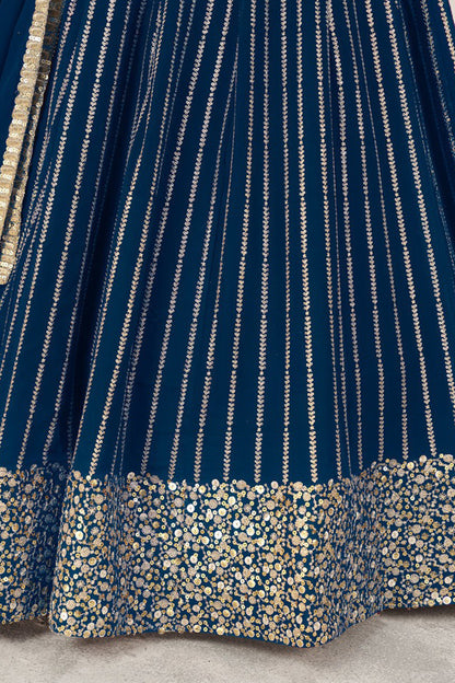Close-up hemline zari work lehenga detail