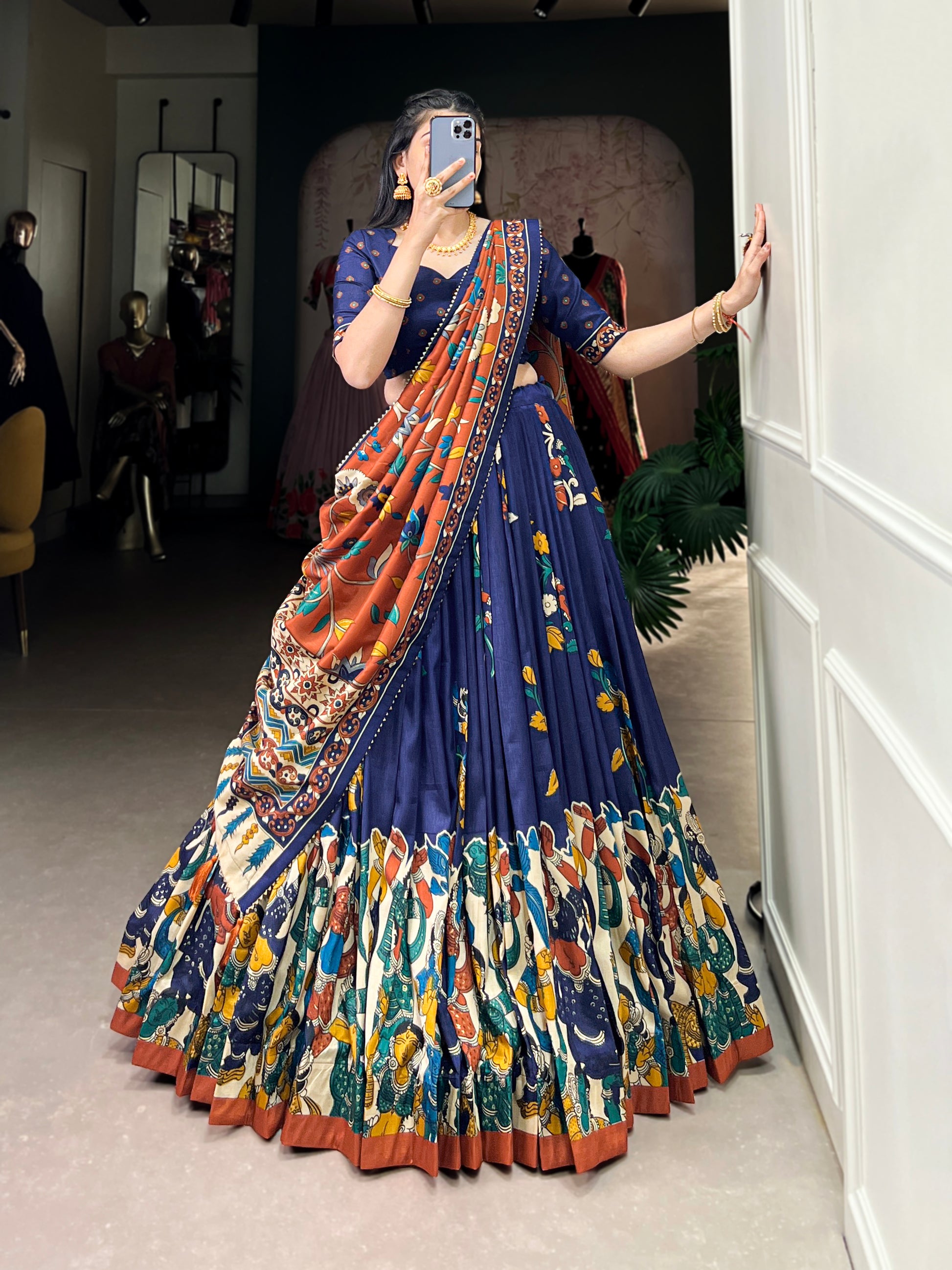 Engagement-ready navy blue lehenga with silk drape