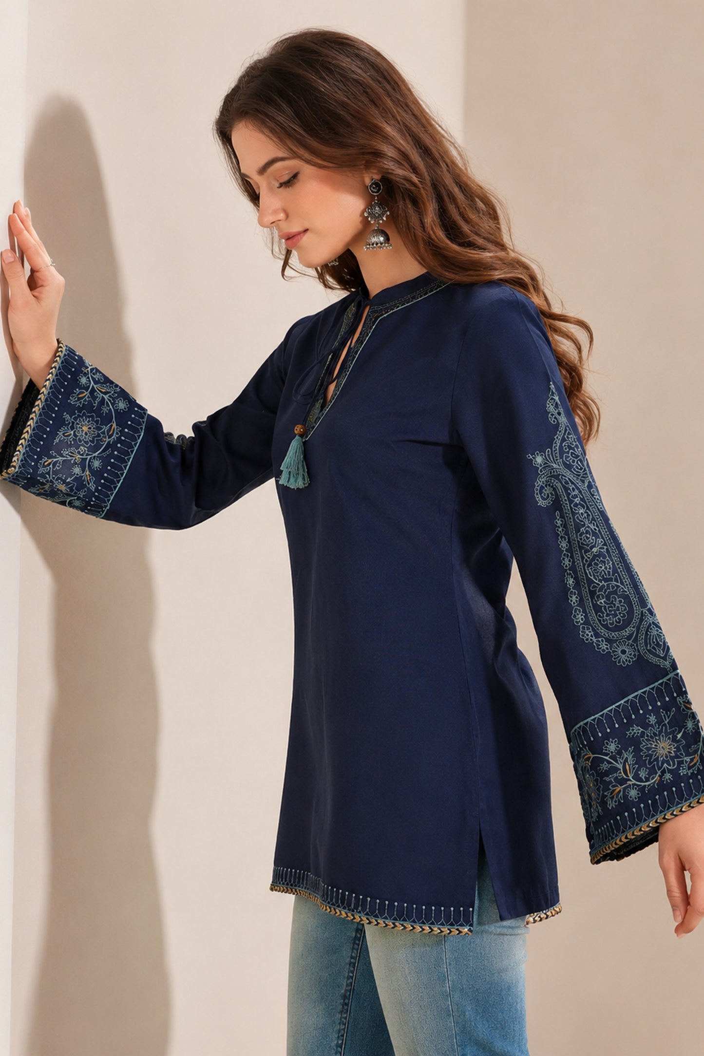 Long sleeve tunic top with thread work neckline