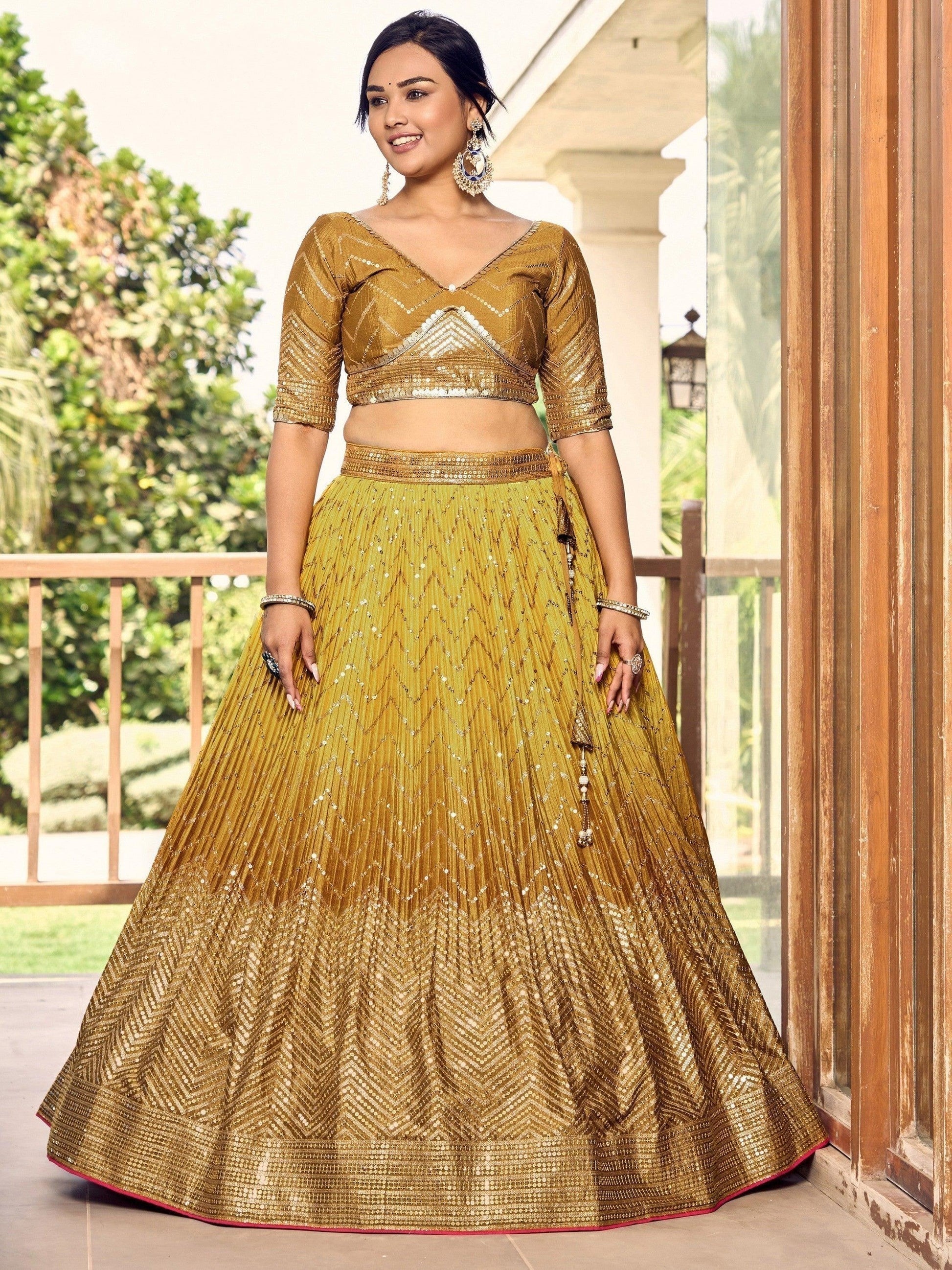 Golden lehenga choli with net dupatta drape detail