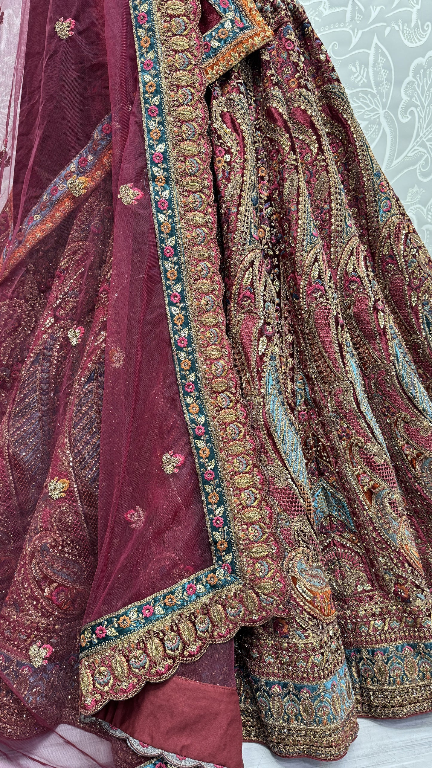 Flow of velvet lehenga fabric in festive lighting