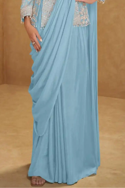 Light blue saree with a plain background