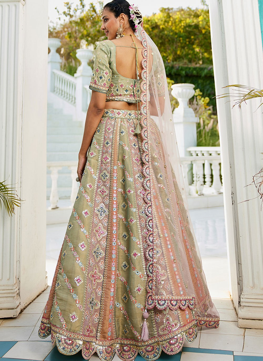 net fabric lehenga choli with gotta patti embroidery detail