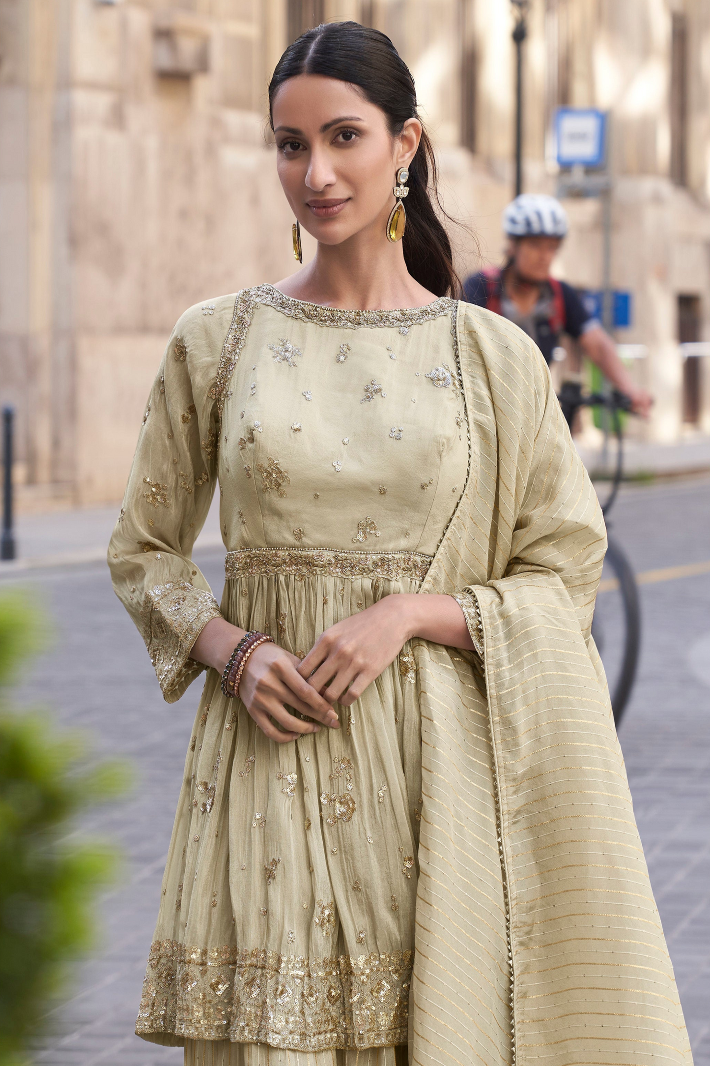 Off white sharara showcasing detailed embroidery pattern