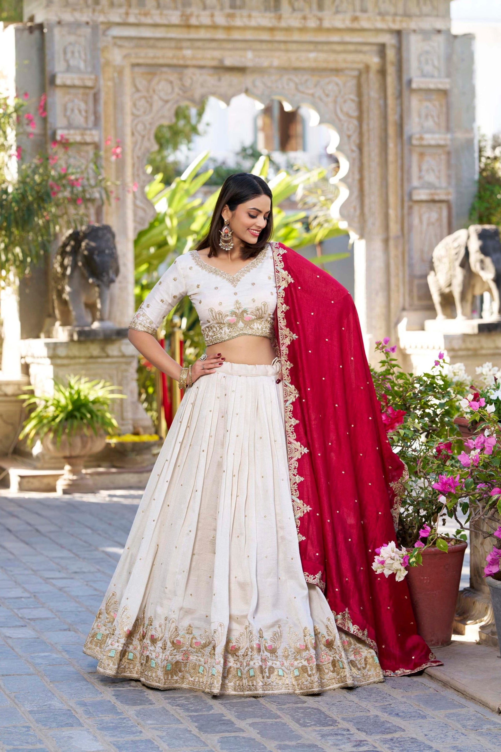 Off-white wedding petticoat lehenga front view with embroidery