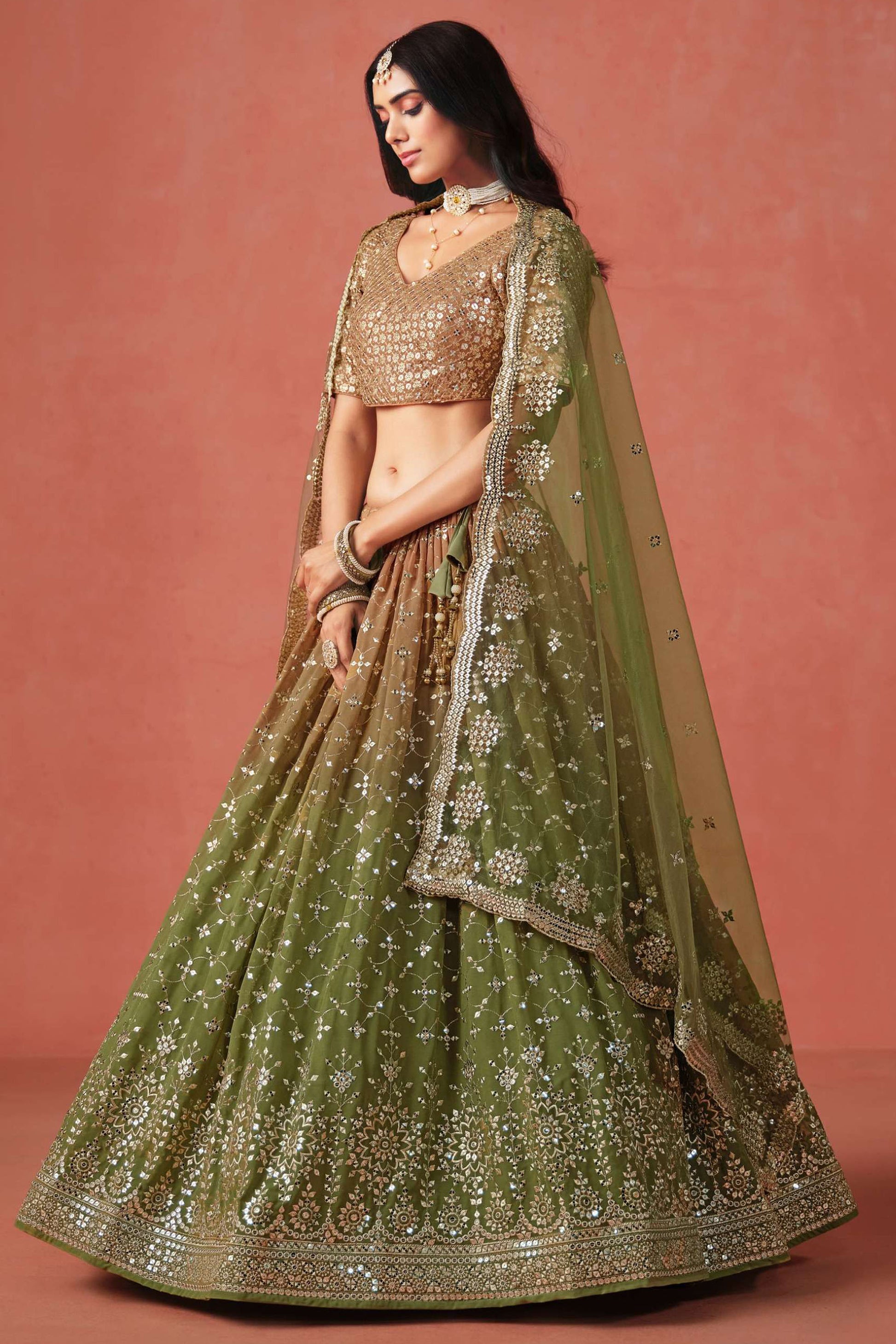 Olive green lehenga choli styled for wedding reception