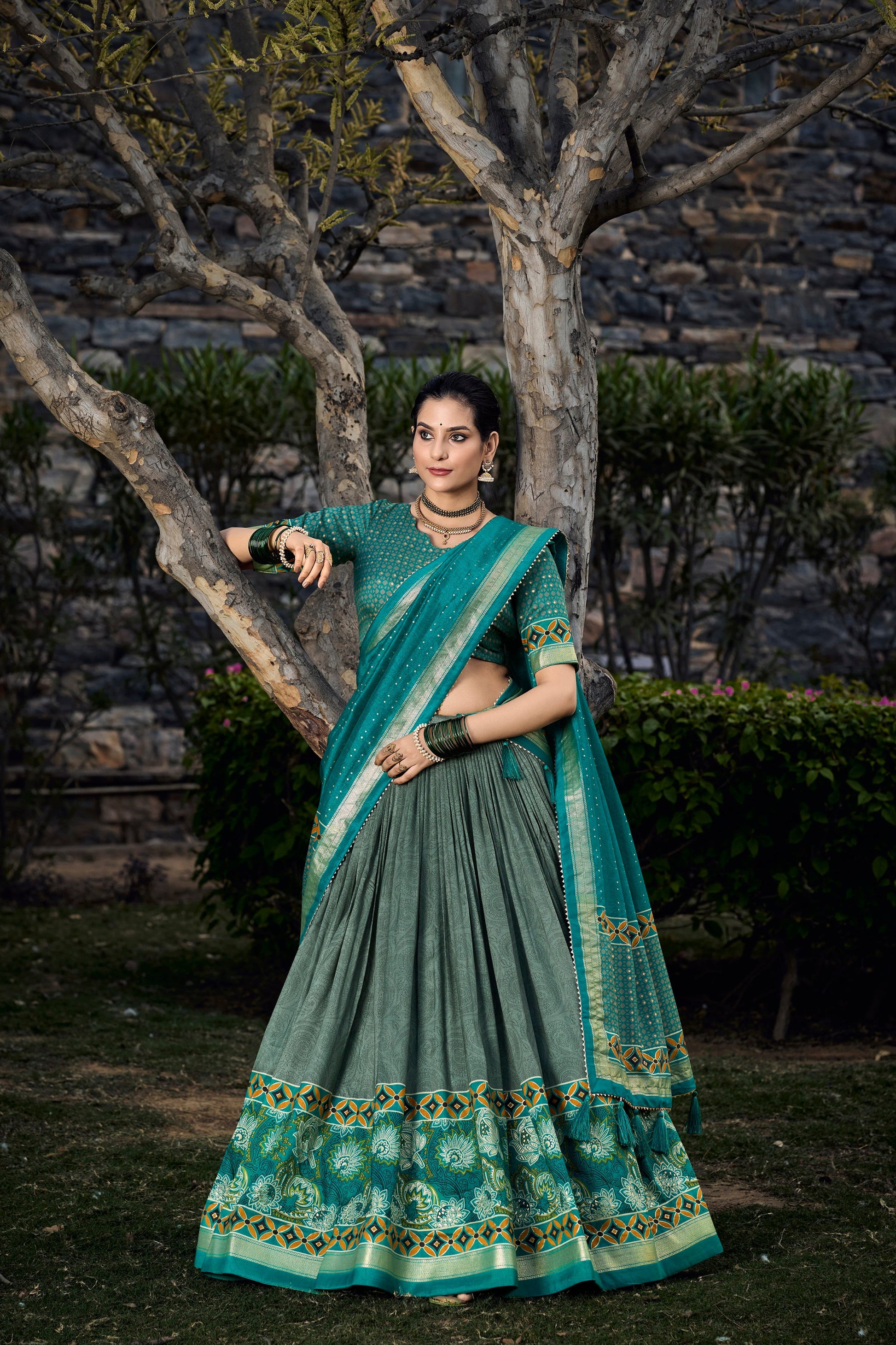 Movement shot showing flow of Tussar silk lehenga