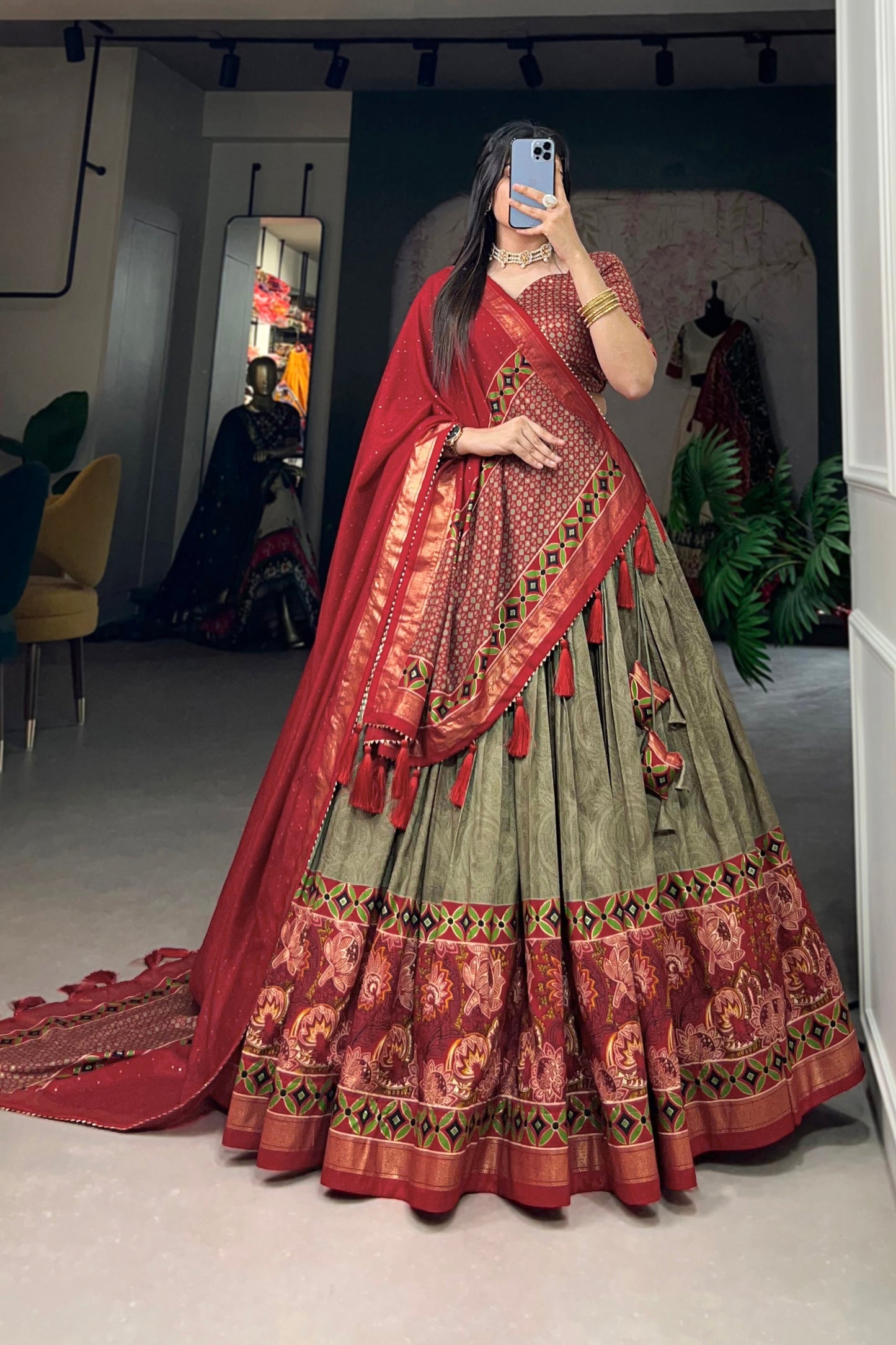 Green lehenga front view with olive tone and foil print