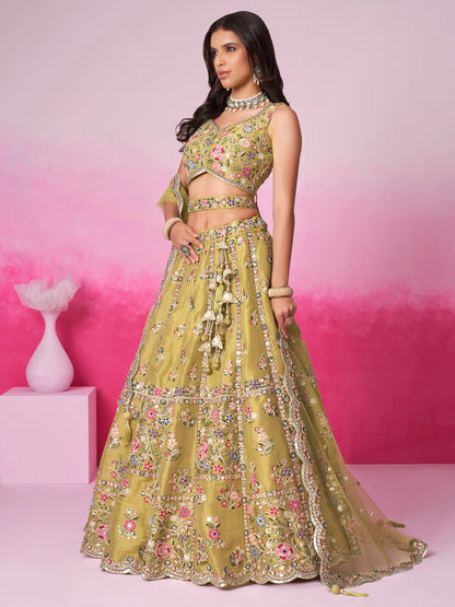 Olive lehenga choli with dupatta draped elegantly
