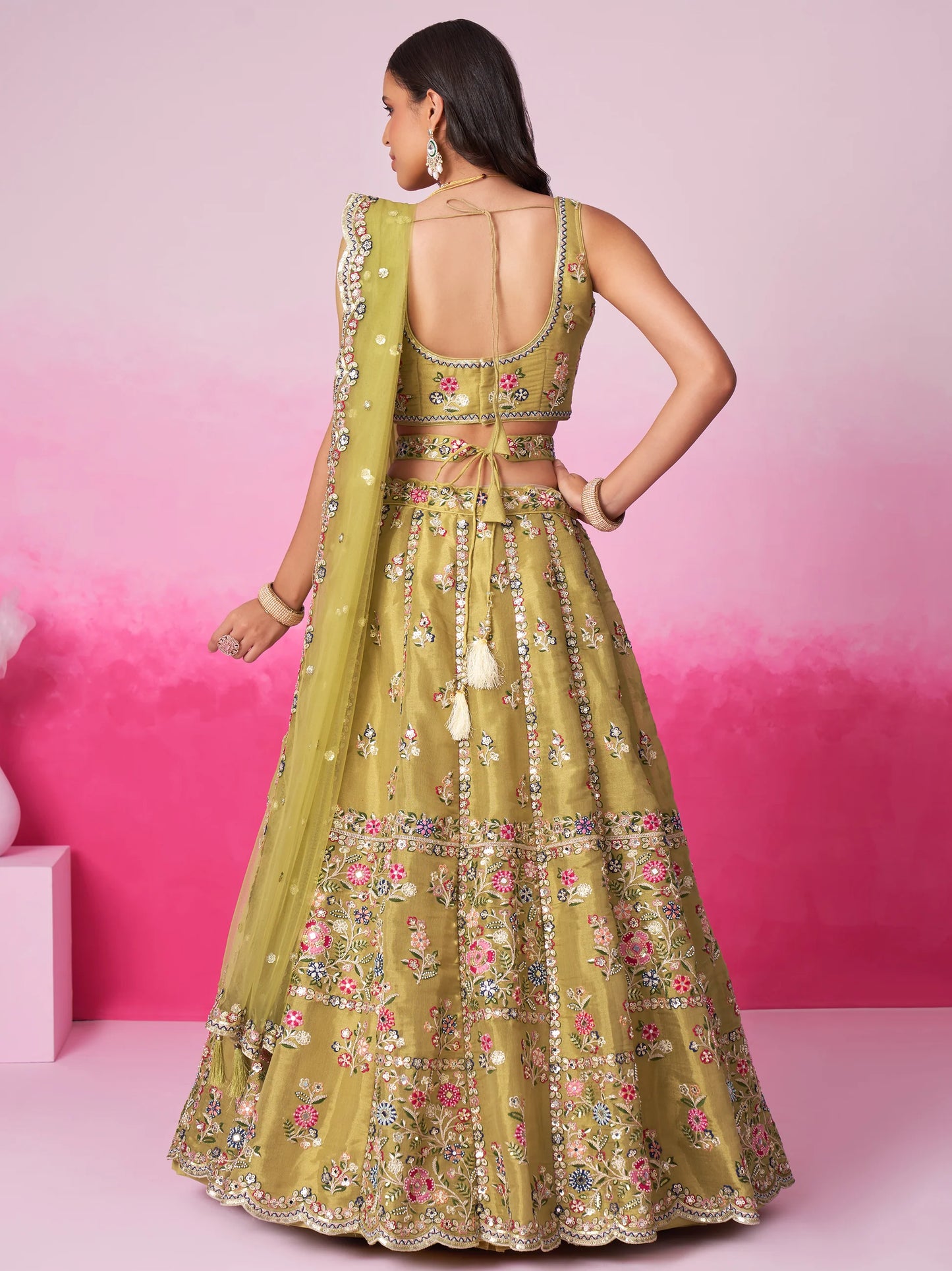 Olive lehenga choli styled for reception occasion