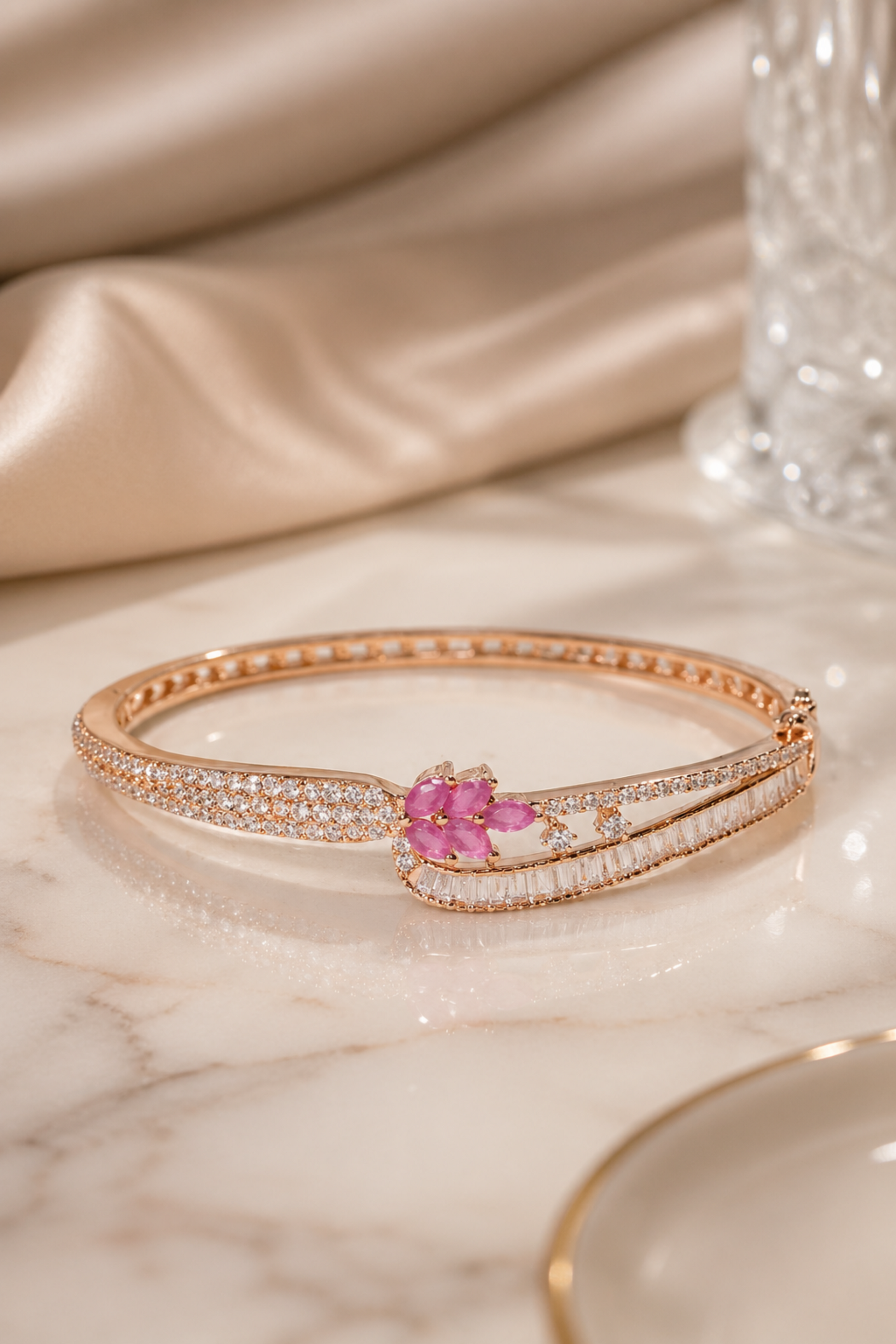 open rose gold bracelet worn on wrist