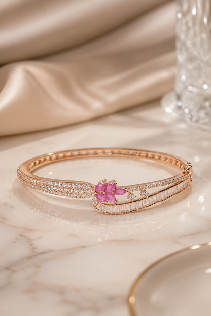 open rose gold bracelet worn on wrist