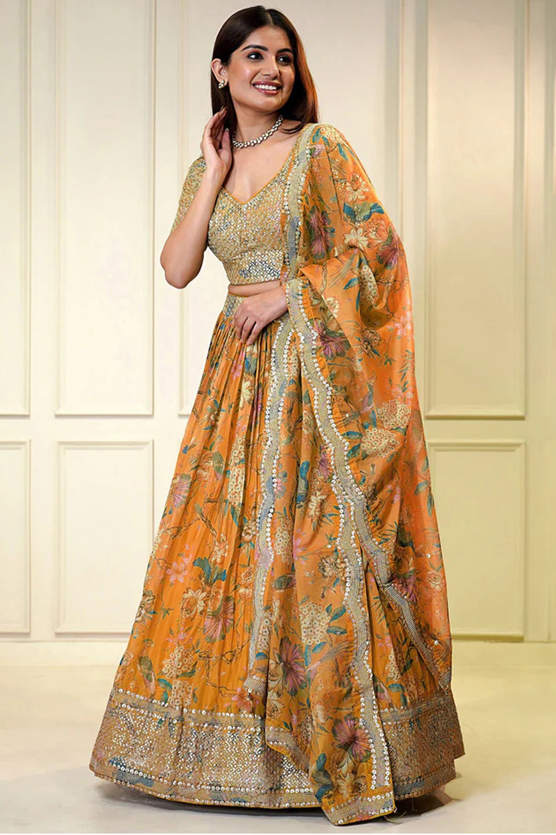 orange chaniya choli front view with floral sequins embroidery