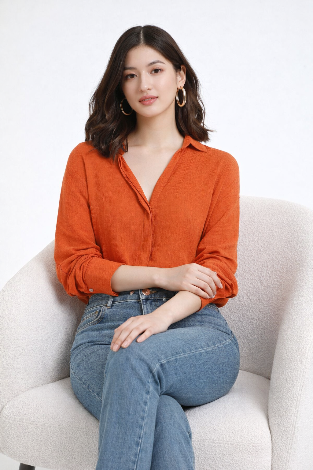 Orange shirt paired with denim for everyday look