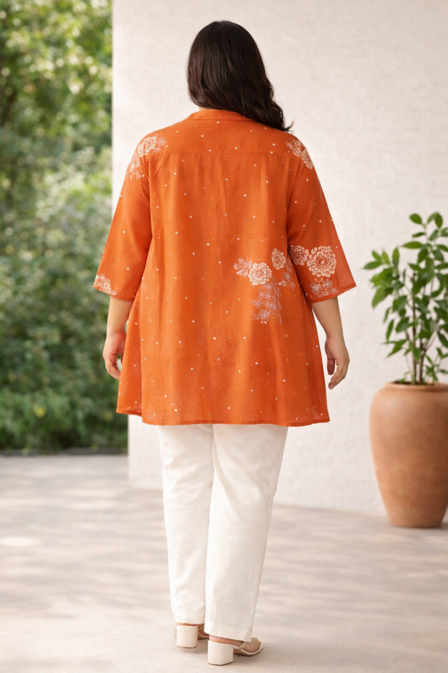 Back view of plus size orange cotton top