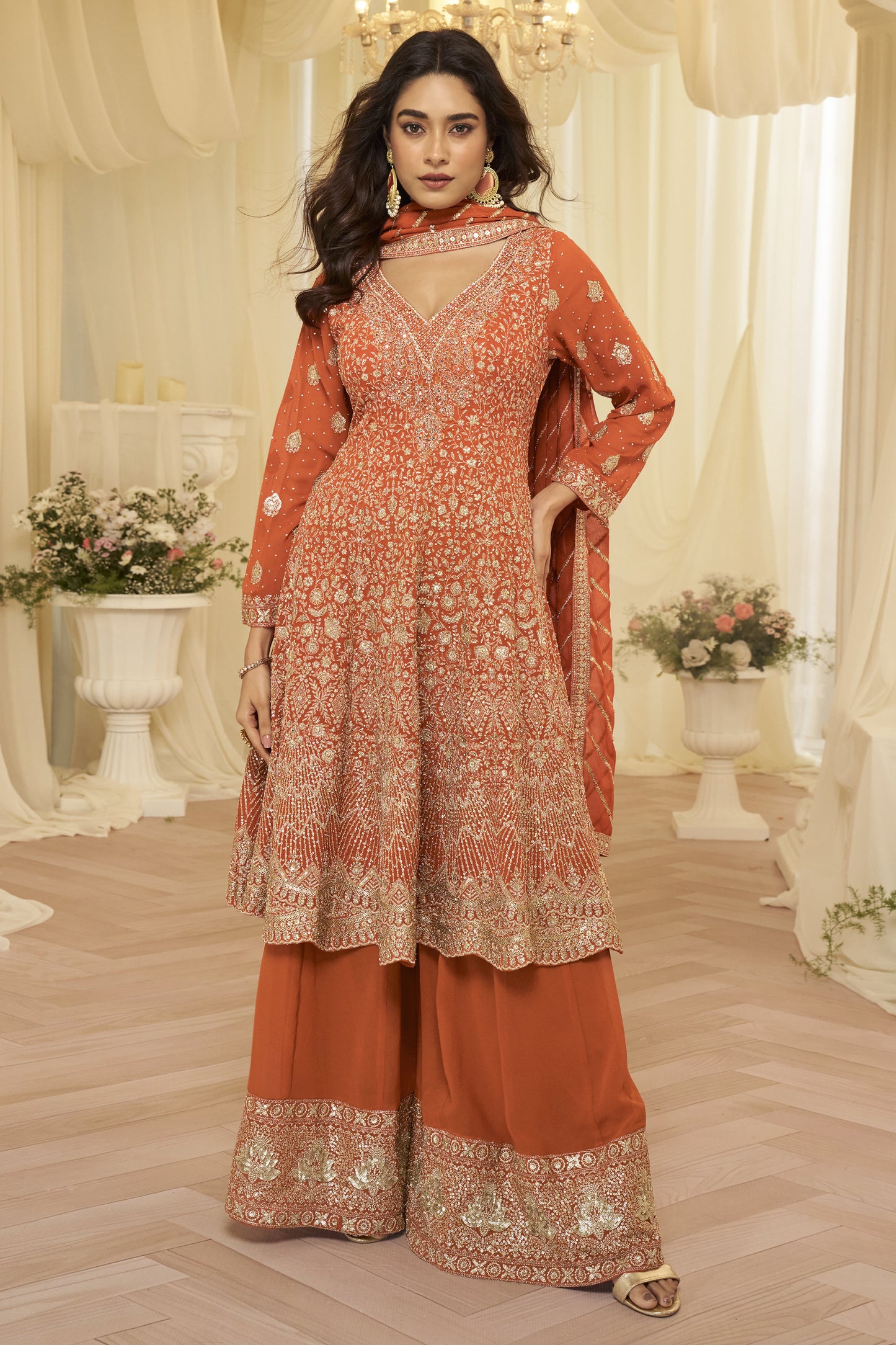 Wedding guest outfit featuring orange embroidered palazzo set