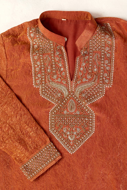 Orange men’s kurta for Eid celebration