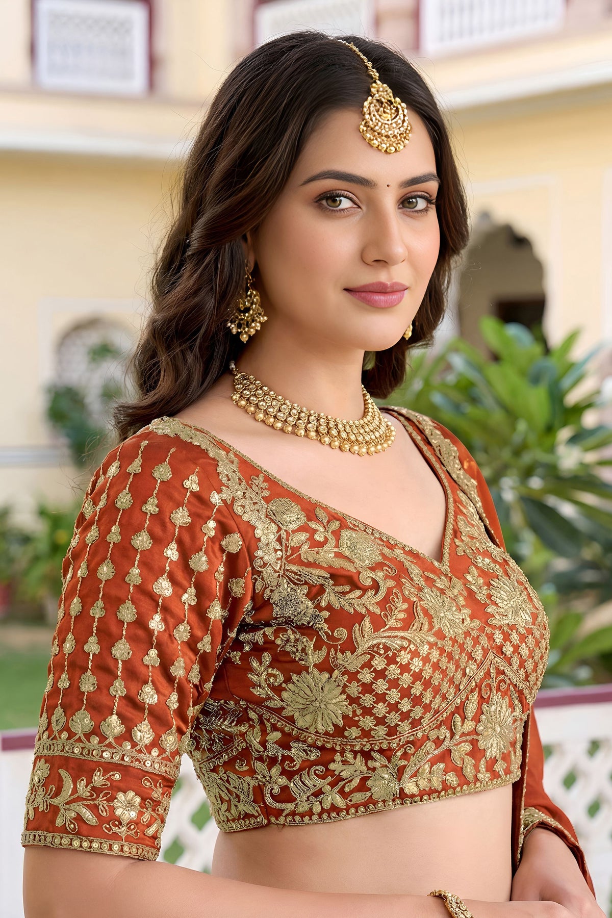 Rangoli silk lehenga choli in orange, full front view