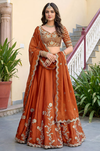 Orange lehenga choli front view with embroidery detail