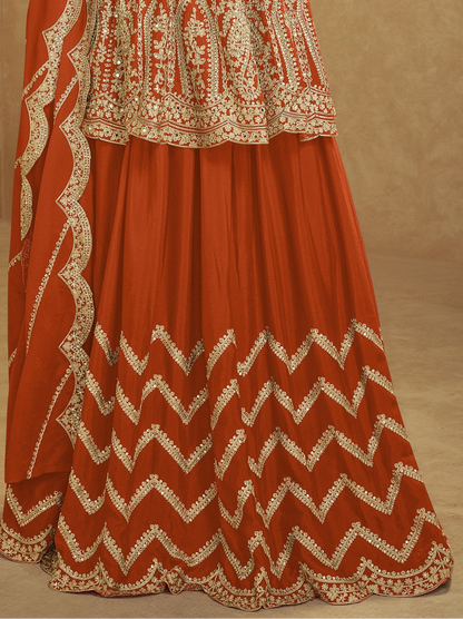 Orange plazzo bottom with matching embroidered top and dupatta