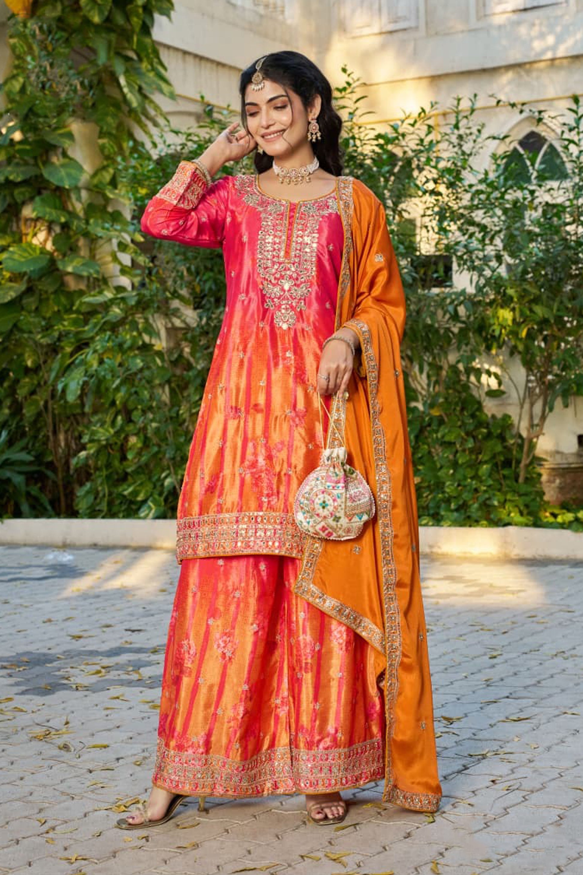 Back view of Orange Palazzo Suit showing full work detail