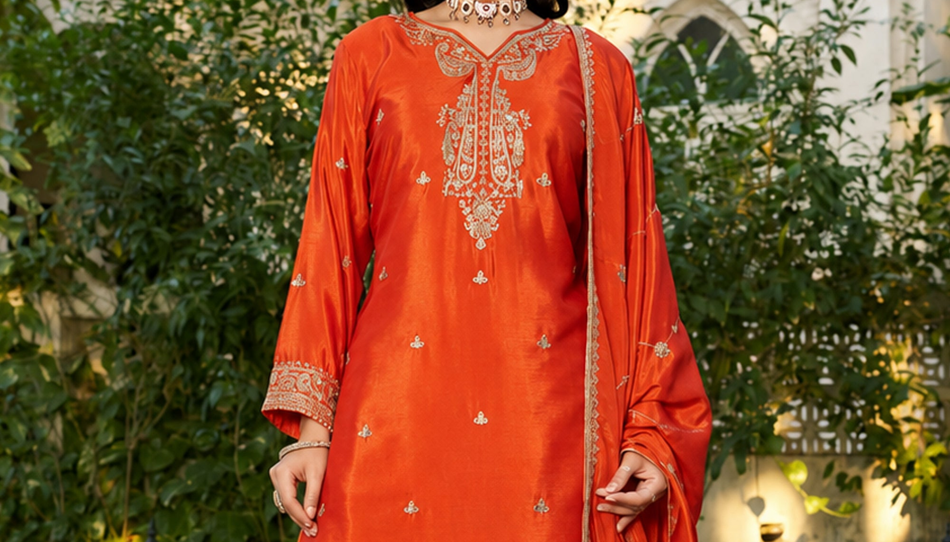 Orange Palazzo Suit displayed with flowing Chinon silhouette