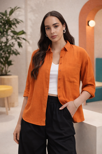 Orange shirt styled for office wear with minimal detailing