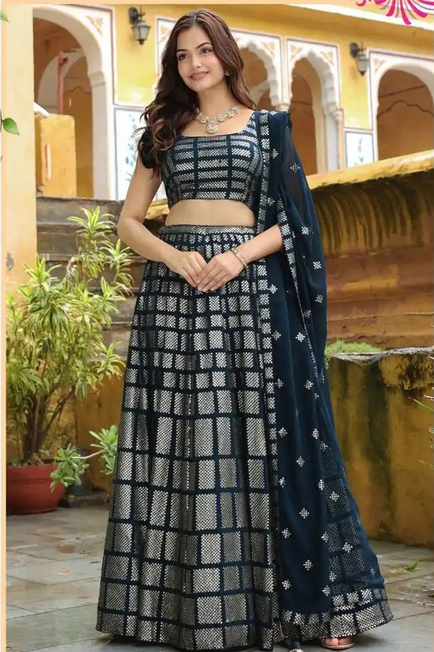 Navy blue festive lehenga choli with fluid drape