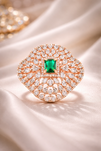 emerald halo statement ring in rose gold
