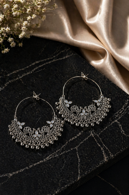 antique silver tribal hoop earrings close view
