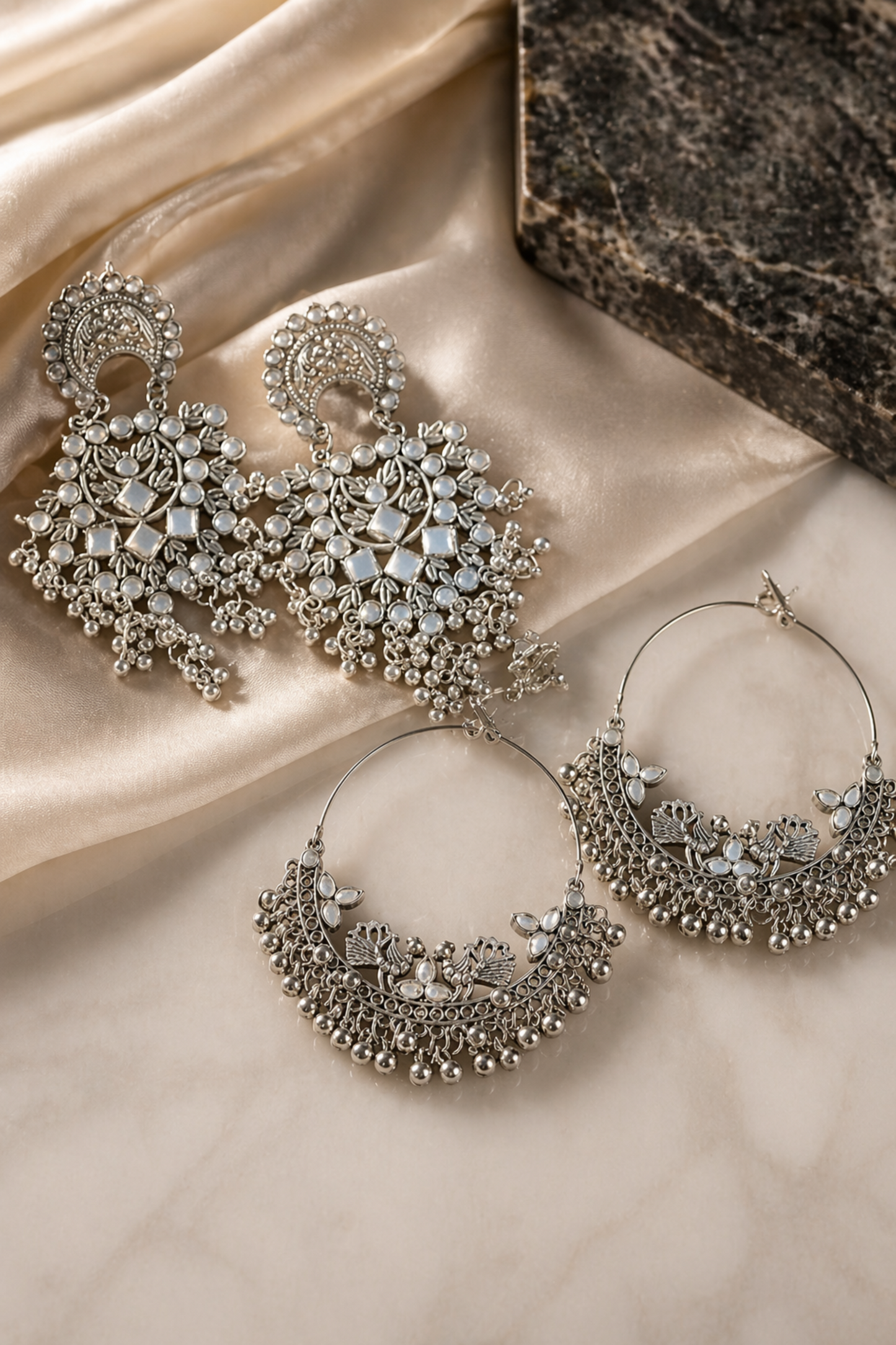 luxury oxidized silver earrings in box
