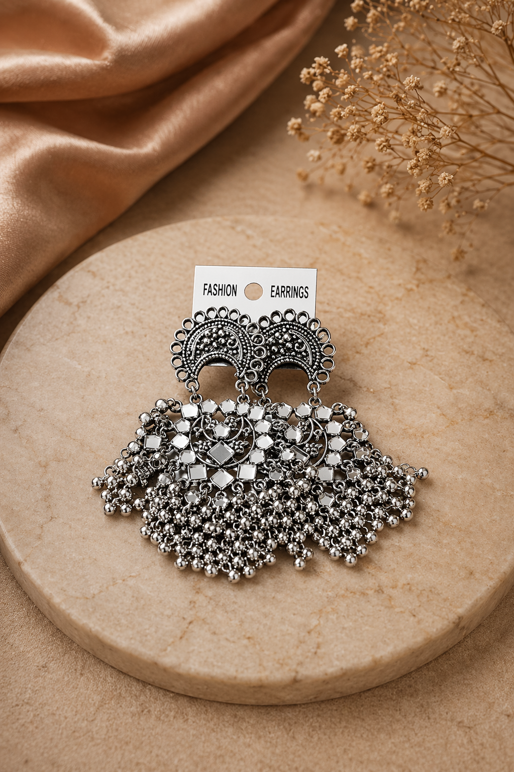 traditional elephant design earrings with pearl fringe
