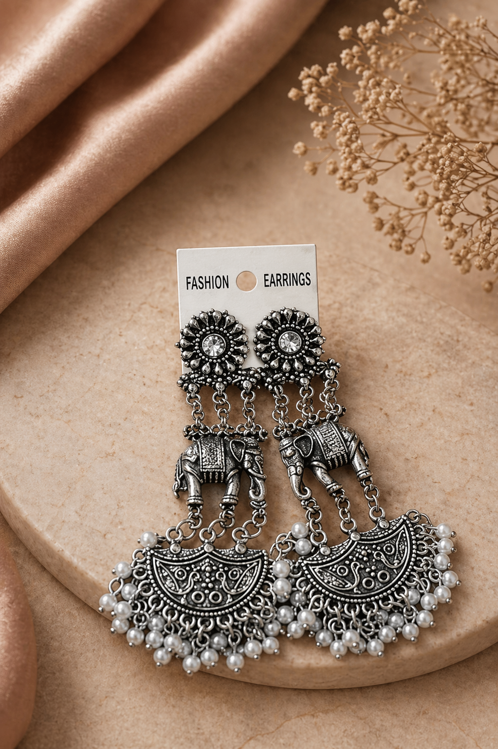 vintage oxidized silver statement earrings close up

