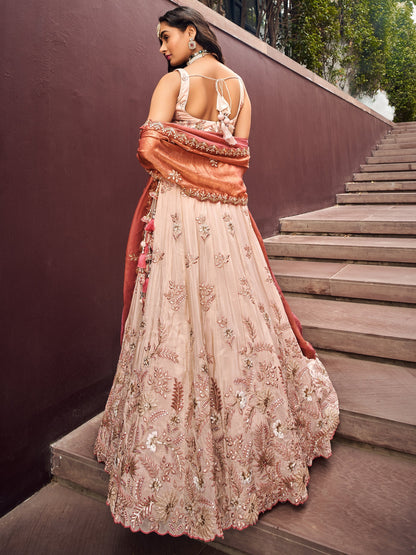 Back view of bridal Peach Beige lehenga choli ensemble