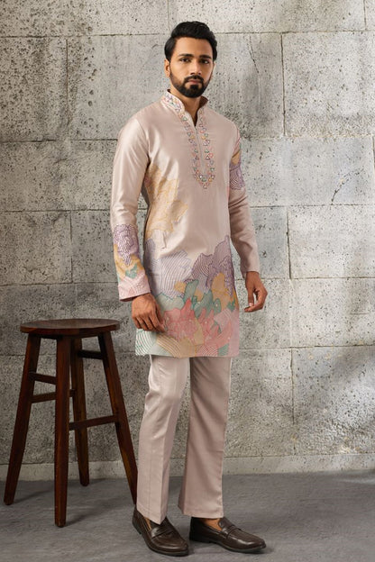 Stitched men's kurta pajama set for wedding wear in peach.