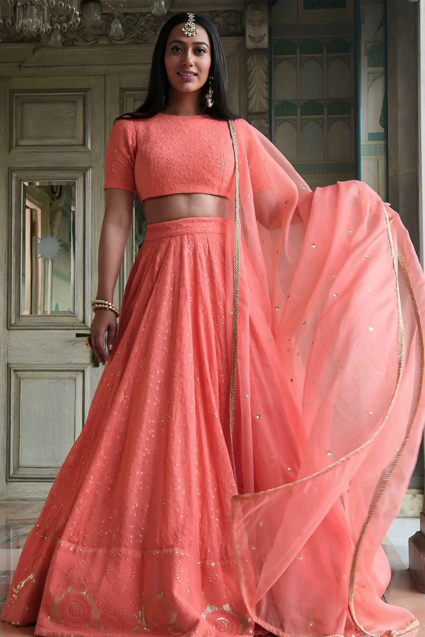 Peach Lehenga Choli with sequins embroidery and Gota Patti border