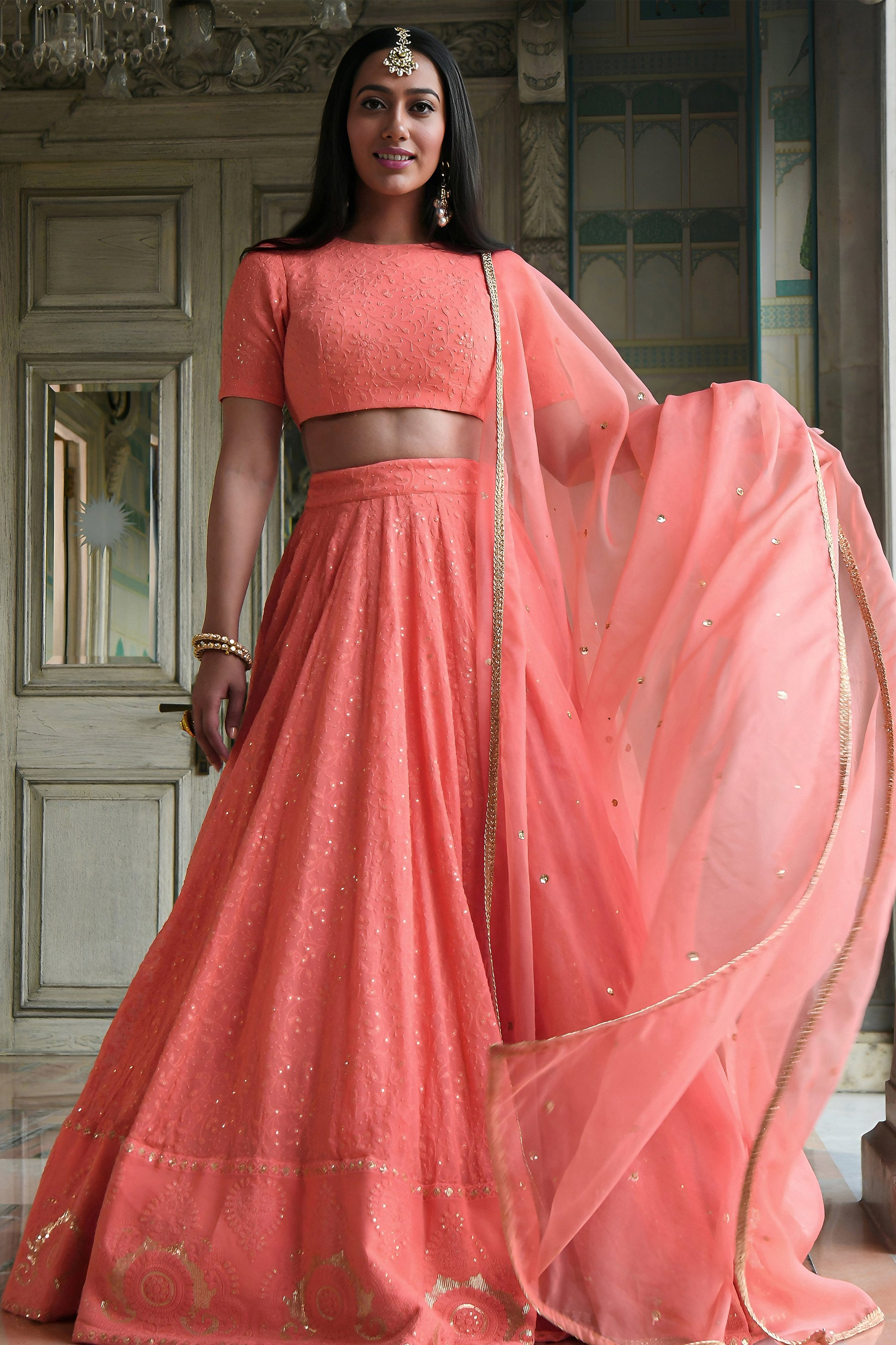 Peach Lehenga Choli with sequins embroidery and Gota Patti border