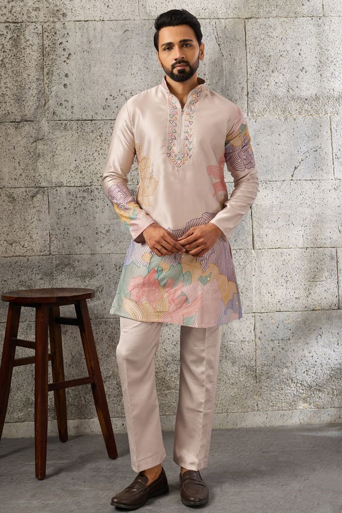 Peach stitched men's kurta pajama set front view.