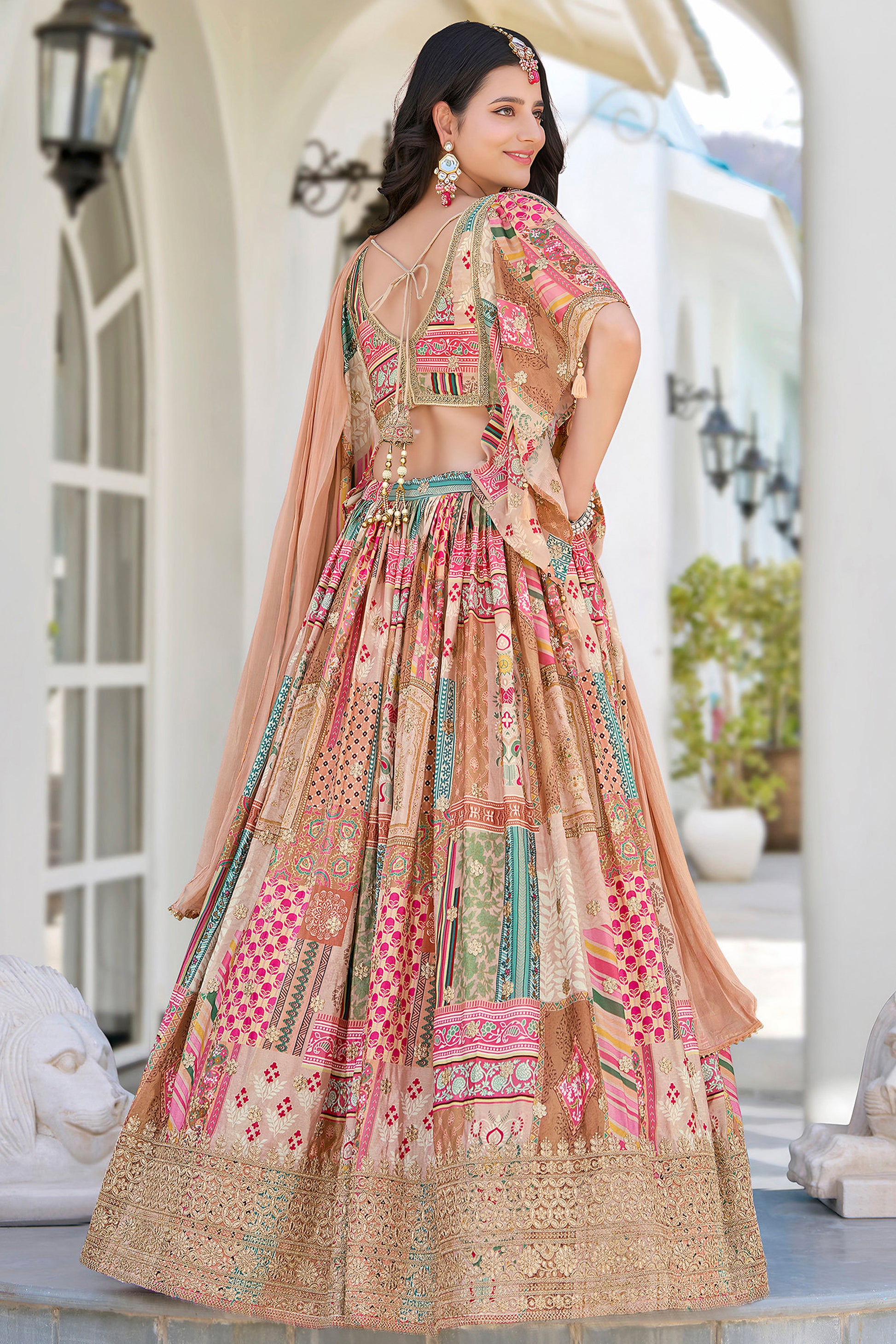peach wedding lehenga choli with zari embroidery detail