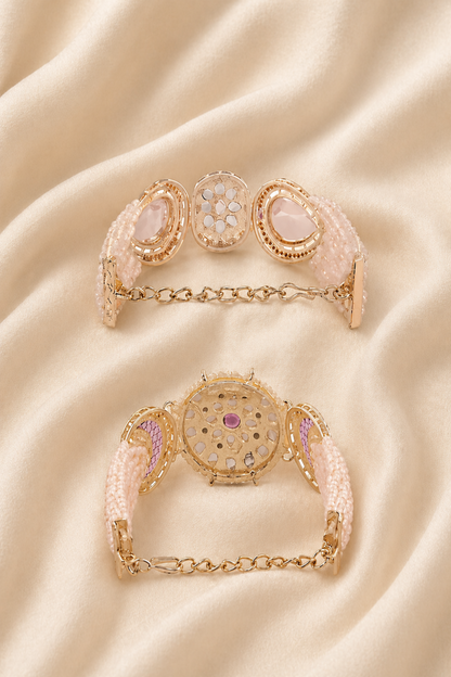 ornate bracelet with pink and clear stone accents