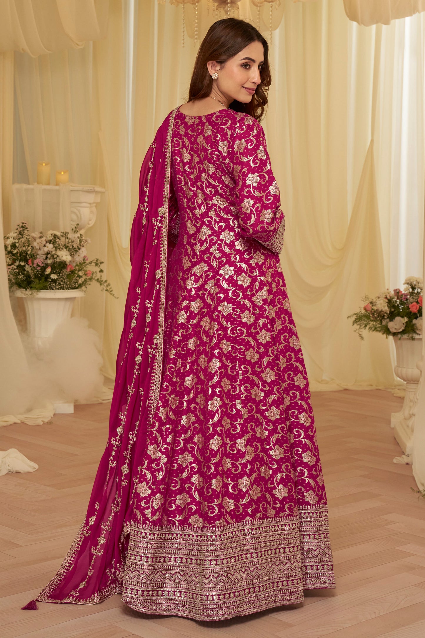 Back view of pink anarkali dress with flowing silhouette