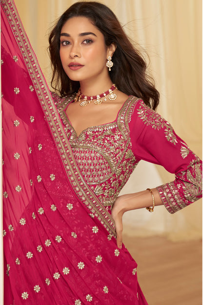 Side view of bright pink Anarkali dress with flare