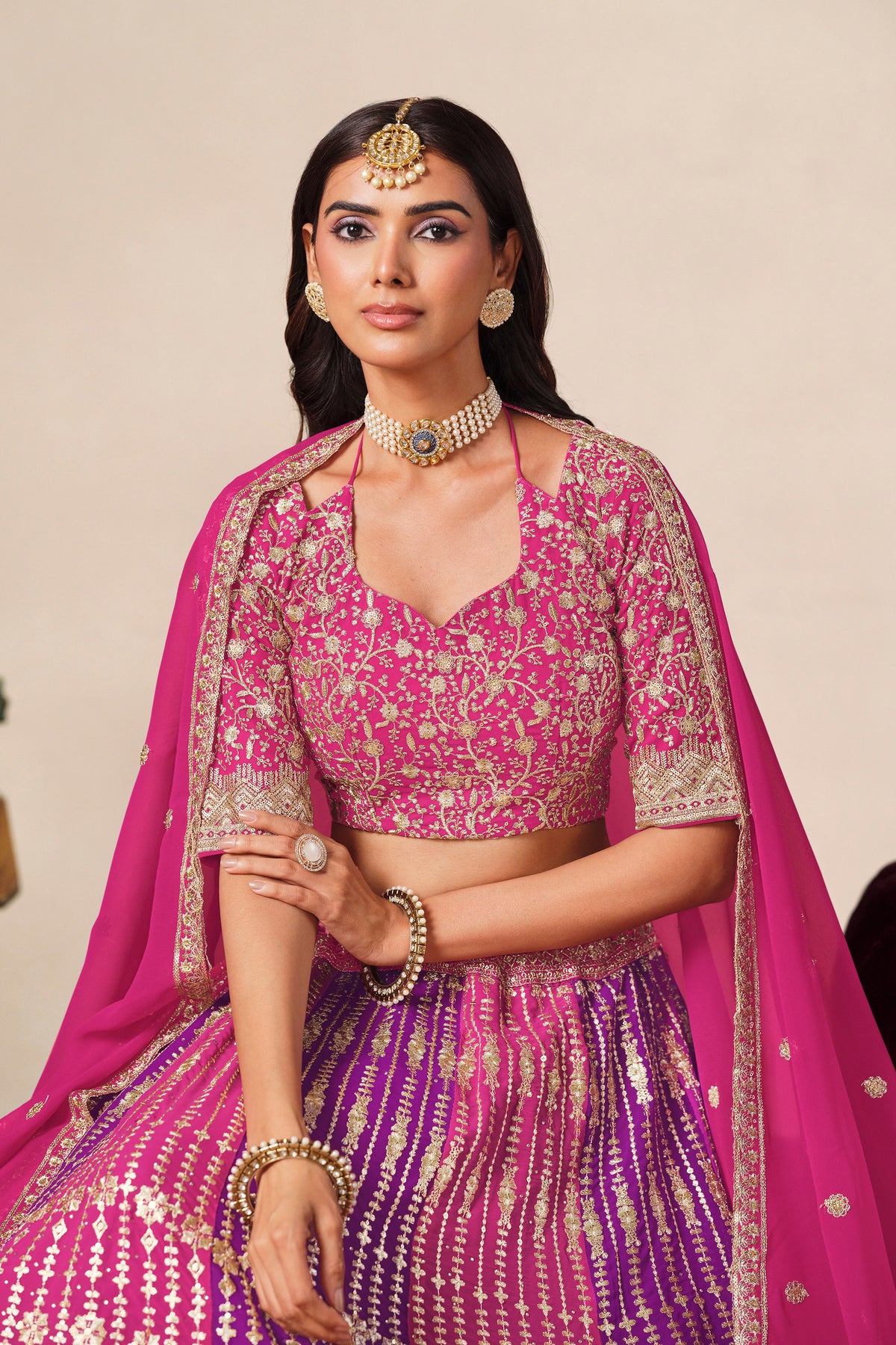 Embroidery detail on the pink blouse