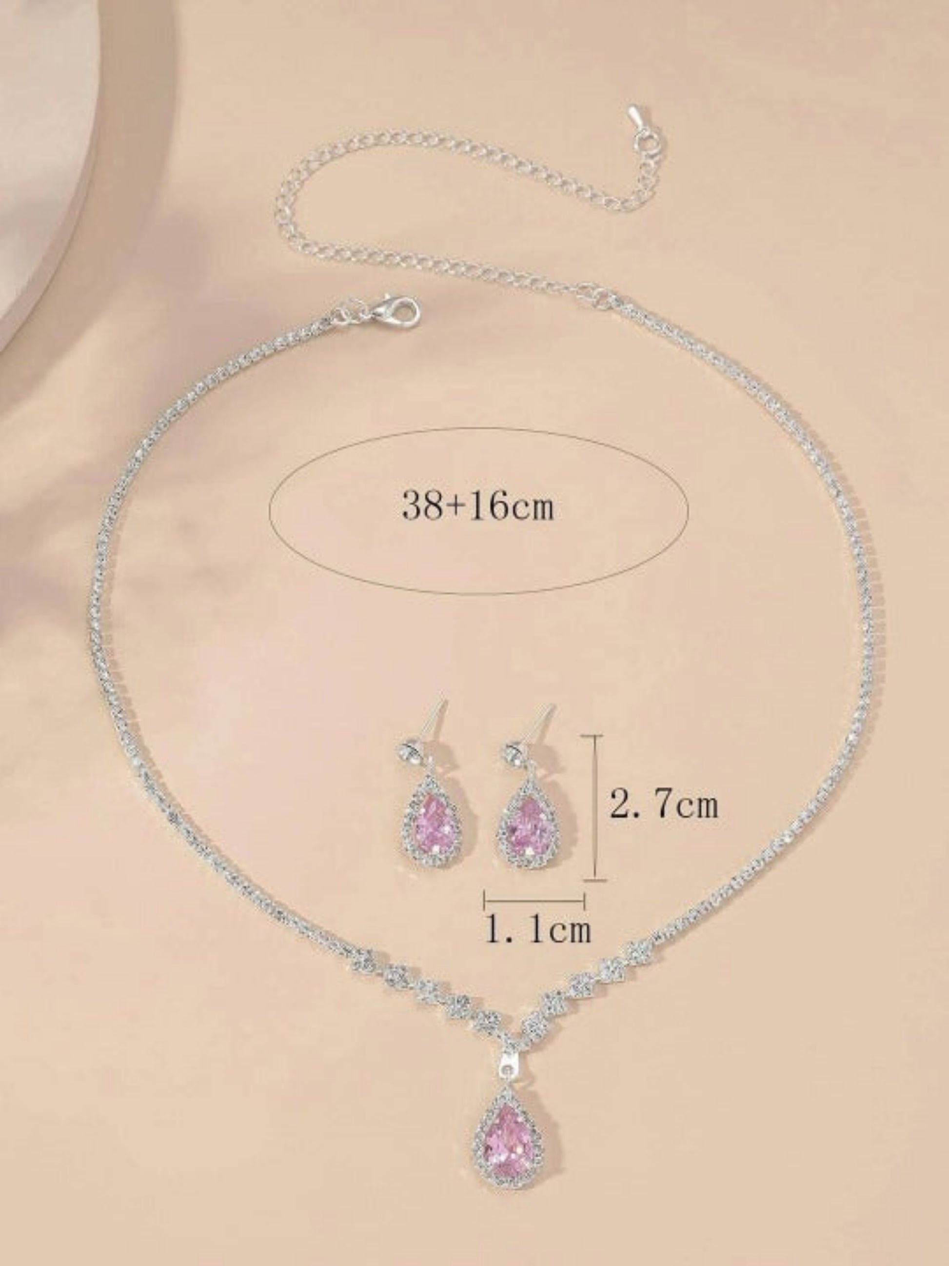minimal silver finish jewelry set with pink stones