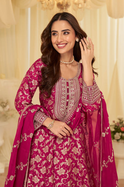 Full-length view of a pink embroidered anarkali dress