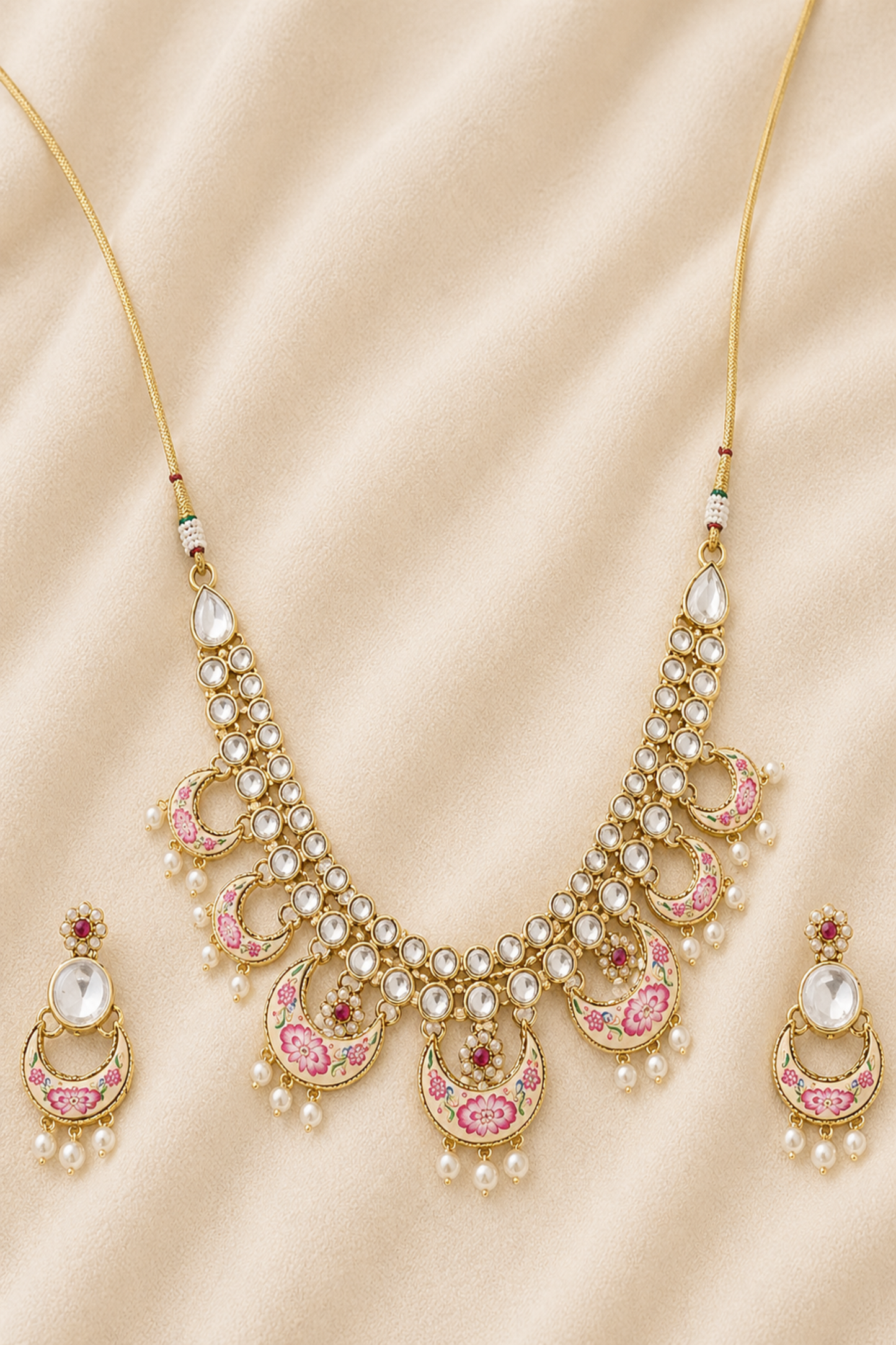 Statement choker necklace on neutral fabric