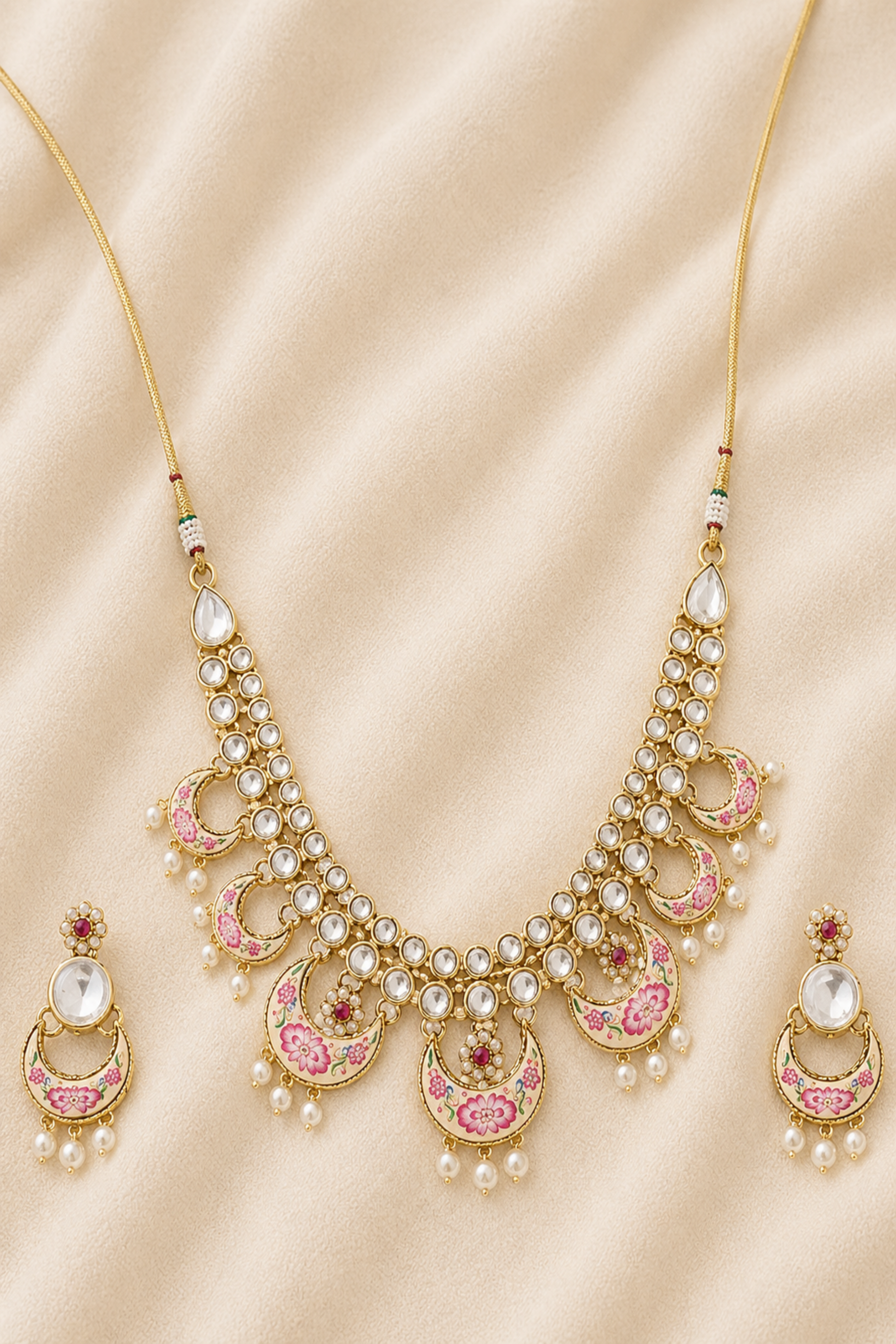 Statement choker necklace on neutral fabric